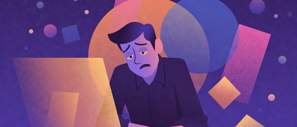 Exhausted person at a laptop, showing recruiting should relieve people
